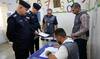 Iraqi forces, displaced people vote early ahead of election